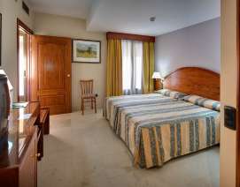 Las mejores habitaciones en Hotel Reina Cristina. La mayor comodidad con nuestra oferta en Teruel